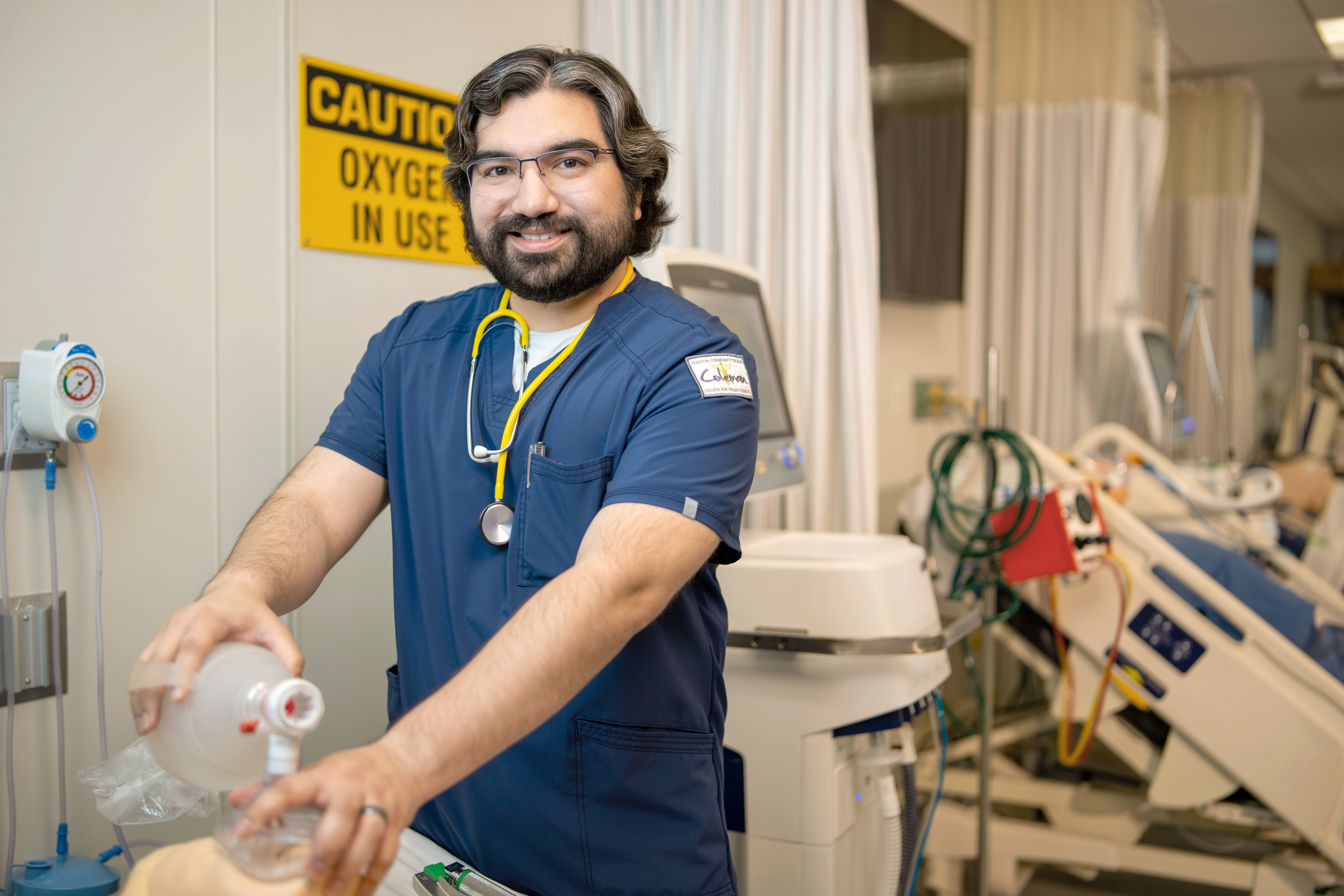 Respiratory Therapy Student examining a test dummy